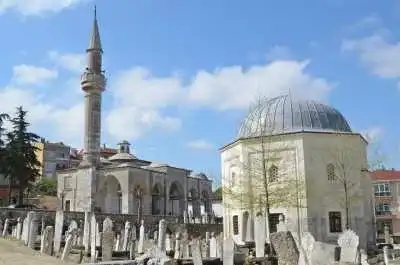 View of the dome and minaret from the graveyard of Beylerbeyi Mosque