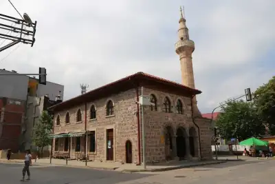 Cinarlar Cami red roof and white minaret, in the square