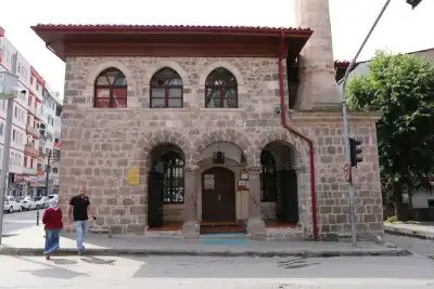 Cinarlar Cami two-story stone facade, on the street side