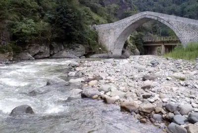 Architecture of Yaglidere Aga Bridge on the gravel riverbed
