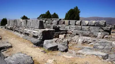 Men Sacred Area ancient statues scattered stones