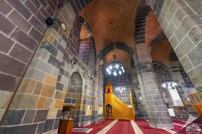 Interior view showing the dome and columns of Alaeddin Bey Mosque
